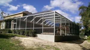 Perkins Seven Oaks Pool Enclosure white Wesley Chapel Block wall stucco Seven Oaks Travertine deck_scale_800_700