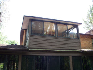 Temple Terrace balcony sunroom conversion with vinyl siding